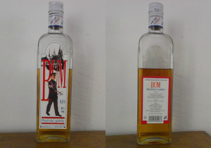 Front and rear photos of a bottle "Bum" tuzemak